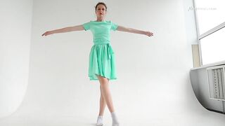 Clothed flexible dark haired Alla Sinichka