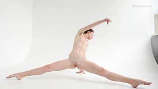 Clothed flexible dark haired Alla Sinichka