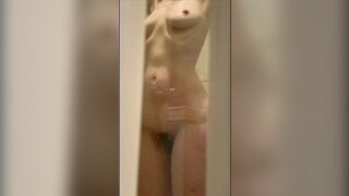 Wifey's soak body through the shower door.