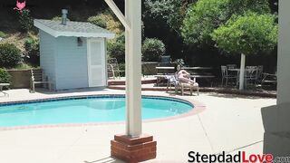 Stepdad drills his young stepdaughter in the living room