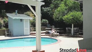 Stepdad drills his young stepdaughter in the living room