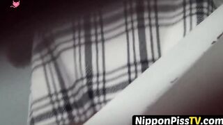 NipponPissTV.com - Japanese amateur filmed during pissing session in public toilet