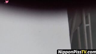 NipponPissTV.com - Japanese babe filmed peeing with voyeur cam in public bathroom