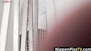NipponPissTV.com - Japanese babe filmed peeing with voyeur cam in public bathroom
