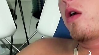 Handsome blonde explores his ass while blowing smoke