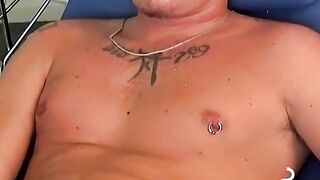 Handsome blonde explores his ass while blowing smoke