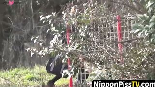 NipponPissTV.com - Kinky chick from Japan keeps track of how much she can pee outdoor