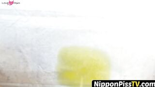 NipponPissTV.com - Japanese chicks in school uniform piss on the bench outside openly