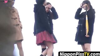 NipponPissTV.com - Kinky schoolgirls from Japan hold each other and pee outside openl