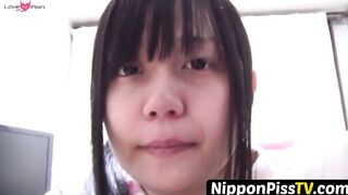 NipponPissTV.com - Naughty Japanese teen pees in a cup while putting makeup on indoor