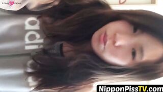 NipponPissTV.com - Japanese chick wakes up and pees in a jar while on the floor indoo