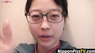 NipponPissTV.com - Kinky Japanese babe plays with her cat after peeing in cups indoor