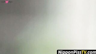 NipponPissTV.com - Japanese cutie fills a cup up with her pee and records it indoors