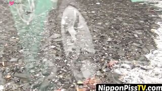 NipponPissTV.com - Japanese cutie fills a cup up with her pee and records it indoors
