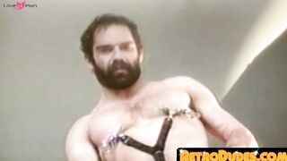RetroDudes.com - Hairy gay man strokes his fat cock in fetish retro clip