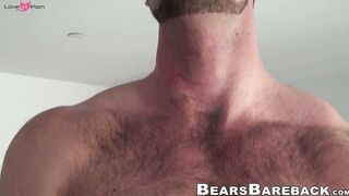 Bryan Knight is a tall hunky bear wtih a massive cock to play with