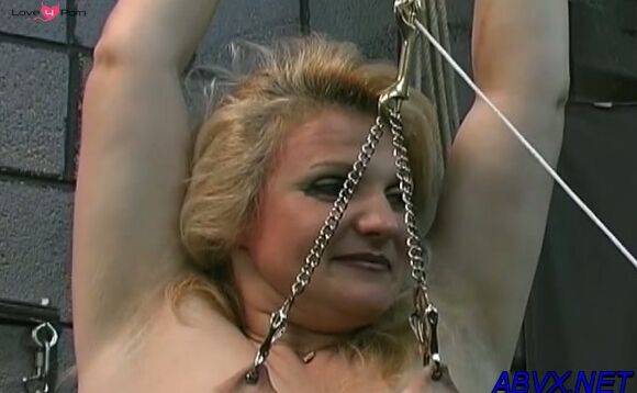 Lusty maid is playing with a huge marital-device