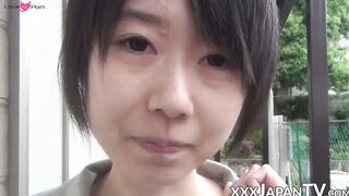 Young Japanese woman shows off butt and twat