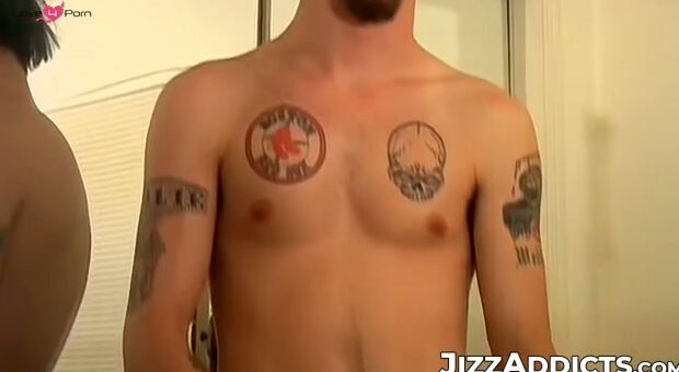 Muscled inked Axel had a tasty mountain jizz after wanking his cock