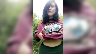 Chubby women gets naked inside field