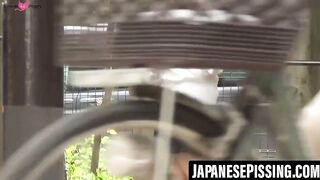 Classy Japanese redhead discovers a secret spot to pee