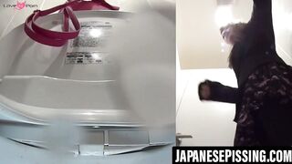 Japanese amateur having fun while pissing