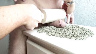 Rolling pin on penis till jizzed