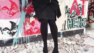 Blonde Lady Walks Then Hangs Her Legs While Sitting