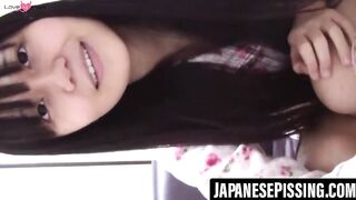 Teen Japanese captured peeing in cup while doing makeup