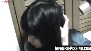 Japanese babe gets playfulness with her cat after pissing