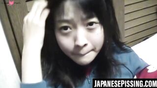 Japanese babe gets playfulness with her cat after pissing