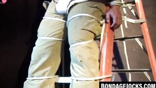 Man in uniform muffled and restrained while looking scared