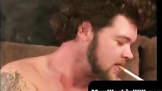 MenWorkinXXX.com - Tattooed stud chilling before jerking big cock for intense cumshot