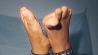 African mom showing off you with her great foot