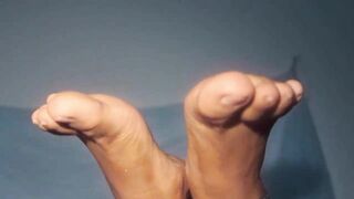 African mom showing off you with her great foot