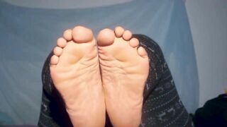 African mom showing off you with her great foot