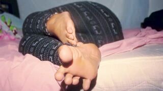 African mom showing off you with her great foot