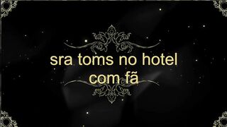 Mrs. Tomis welcoming a fan to the hotel, fulfilling the