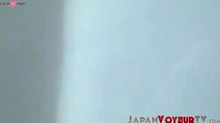 Asian woman gropes her tits and fingers her cunt like a man would