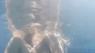 Twincest lesbian fun! Hot blonde twins play water games in pool
