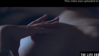 Rubbing her long puffy nipples as she fucks herself with