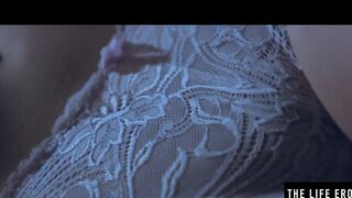 Rubbing her long puffy nipples as she fucks herself with