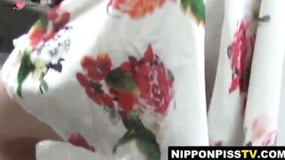 Kinky Asian babe loses control and pisses without stopping