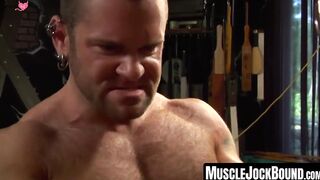 MuscleJockBound.com - Duncan Murphy roped up for hard dungeon torment