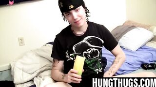 Thug uses cucumber to help stroke his stiff cock