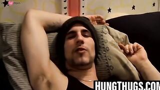 Tattooed dude puffs cigars while jerking slowly