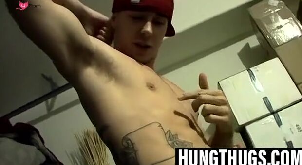 Tattooed straight jock strokes his cock solo and blows