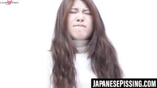 Attractive secretary fidgets as she desperately needs to pee