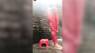 Chubby Woman in Wet Red Outfit Dancing on Stool