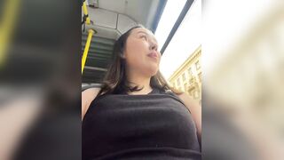Asian Girl in Pink Jacket Teasing on Public Transport